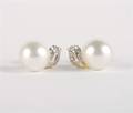 A Pair of 18 Karat Yellow Gold South Sea Cultured Pearl and Diamond Earrings