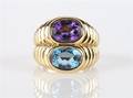 An 18 Karat Yellow Gold Amethyst and Blue Topaz Ring Bulgari