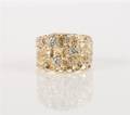 A 14 Karat Yellow Gold and Diamond Nugget Ring