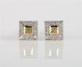 A Pair of Yellow and White Gold and Diamond Cufflinks