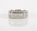 An 18 Karat White Gold and Diamond Ring