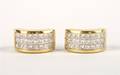 A Pair of 18 Karat Yellow Gold and Diamond Earrings