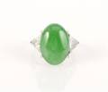 A Platinum Apple Green Jadeite and Diamond Ring