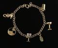 A 14 Karat Yellow Gold Charm Bracelet