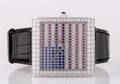 An 18 Karat White Gold Diamond Ruby and Sapphire American Flag Wristwatch Corum