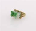 A Yellow Gold and Carved Jade Ring