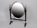 34 EBONIZED WOOD AND SILVER PLATED VANITY MIRROR