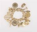 A 14 Karat Yellow Gold Charm Bracelet