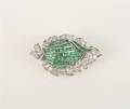 A Platinum Emerald and Diamond Brooch