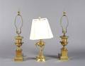 A Group of Three Brass Lamps