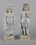 A Group of Two Bisque Porcelain Figures