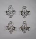A Set of Four French Iron Sconces