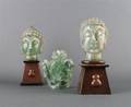 A Pair of Chinese Hardstone Heads of Buddha
