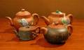 A Group of Three Chinese Yixing Stoneware Teapots