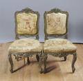 A Pair of Louis XV Style Carved Giltwood Chairs