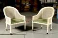 A Pair of Caned Upholstered Bergere Chairs Widdicomb