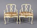 A Pair of Neoclassical Style Painted and Parcel Gilt Arm Chairs
