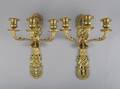 A Pair of Neoclassical Style Brass Three Light Sconces
