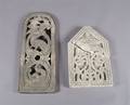 Two Carved Stone Panels