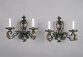 A Pair of Painted and ParcelGilt Iron TwoLight Sconces