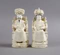 A Pair of Chinese Carved Ivory Figures of a Emperor and Empress