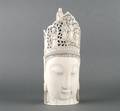 A Chinese Carved and Pierced Ivory Carving of a Head of Buddha
