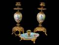 306 PAIR OF PORCELAIN AND BRASS CANDLESTICKS