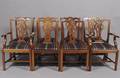 A Set of Eight Chippendale Style Dining Chairs
