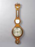 An English Fruitwood Wheel Barometer and Clock