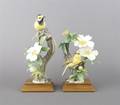 A Pair of Dorothy Doughty Hooded Warblers and Cherokee Rose Bisque Birds Royal Worcester