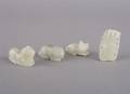 A Group of Four Chinese Carved Jade Articles
