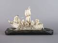 A Japanese Ivory Figural Group of Men on a Fishing Boat