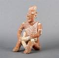 A Jalisco Style Pottery Figure