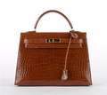 An Hermes Caramel Crocodile Kelly Bag