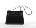 An Hermes Black Leather Miniature Kelly Handbag