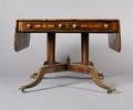 A Regency Style Mahogany and Inlaid Pembroke Table
