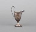 A George III Sterling Silver Helmet Form Creamer Hester Bateman London