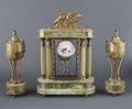 A French Champleve and Green Onyx Three Piece Clock Garniture