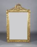 A Rococo Style Giltwood Mirror