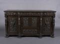 A Continental Renaissance Revival Carved Oak Sideboard