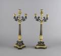 A Pair of Empire Style Gilt and Patinated Bronze FourLight Candelabra
