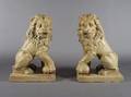A Pair of Terracotta Figures of Seated Lions