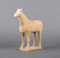 A Chinese Painted Pottery Figure of a Horse