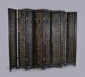 A Chinese Coromandel Eight Panel Floor Screen