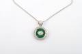 An 18 Karat White Gold Emerald and Diamond Pendant