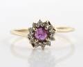 A 14 Karat Yellow Gold Ruby and Diamond Ring