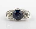 An 18 Karat White Gold Blue Sapphire and Diamond Ring