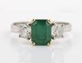 A Platinum Emerald and Diamond Ring