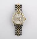 A 14 Karat Yellow Gold and Stainless Steel Wristwatch Rolex