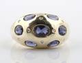 A 10 Karat Yellow Gold Iolite and Diamond Ring